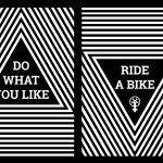 Image of a black and white poster featuring the words Do What you Like Ride a Bike