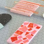 Pink MA Textile Design stones and surface design by Victoria Paulley displayed in the MA Degree Show at Norwich University of the Arts