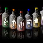 Image of designed sour shots bottles featuring illustrations of snakes and bright colours