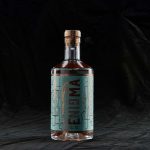 Designed gin bottle with the words 'Enigma' on by BA Graphic Design graduate Tom Baines