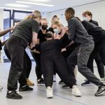 Acting students doing trust falls