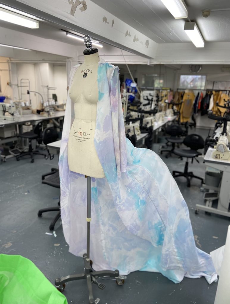 A photo of Brooke Savino's MA Fashion design on a mannequin in the fashion studio. 