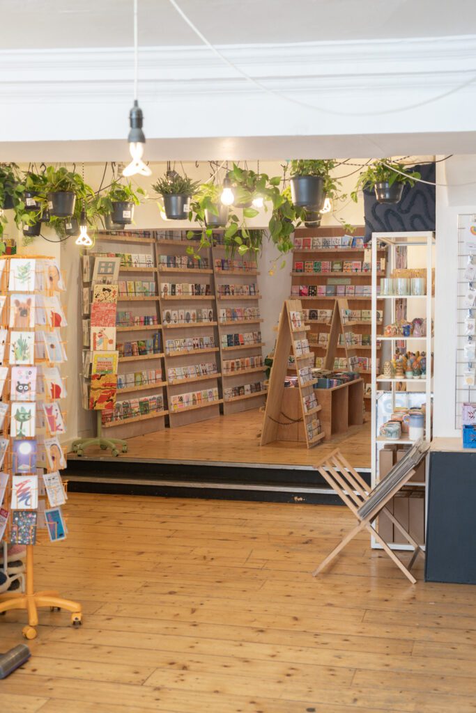 A photo of inside a shop that sells cards.