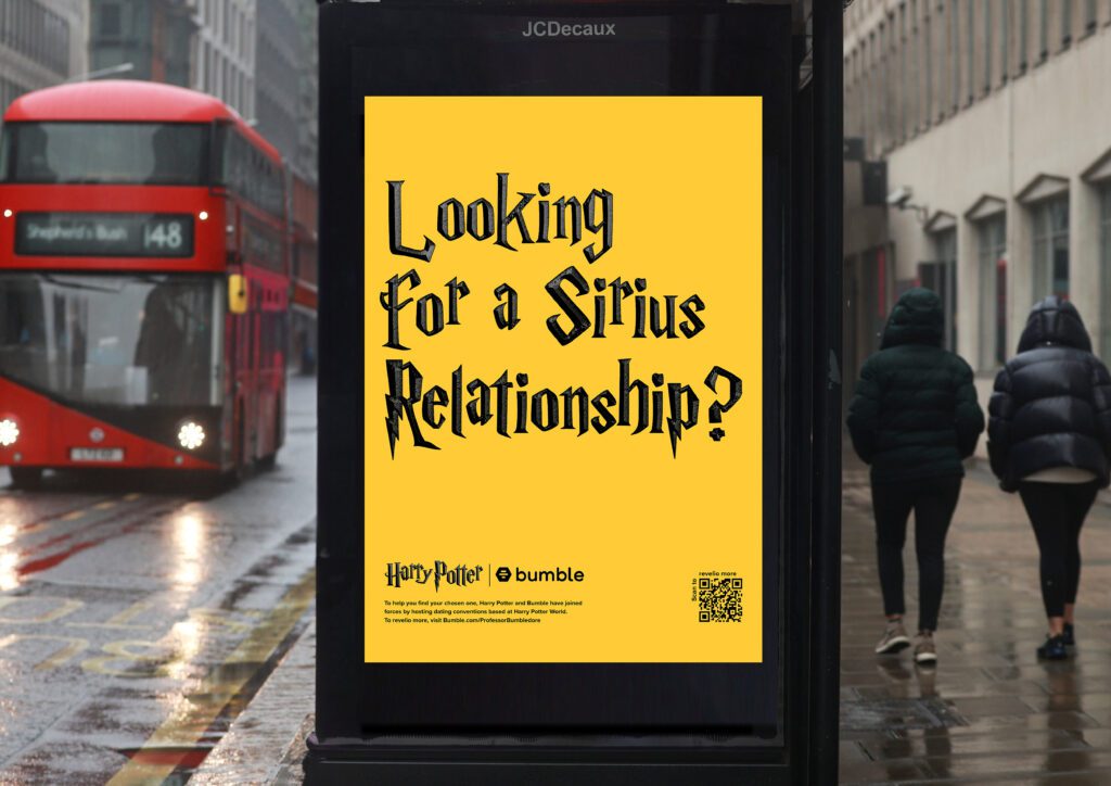 A yellow poster on a buss stop shelter. 